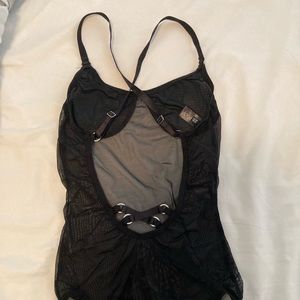 Black mesh size XS bodysuit with adjustable straps. Worn once.